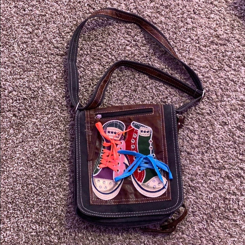Bag with Shoe Design has tie able shoelaces